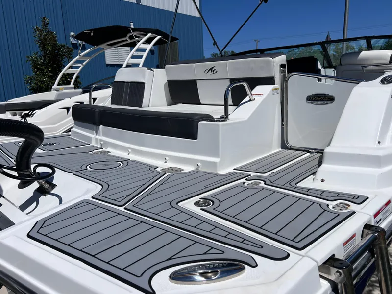 Slide: The Image of 2022 Monterey M45 boat with sleek deck design and comfortable seating. - 11