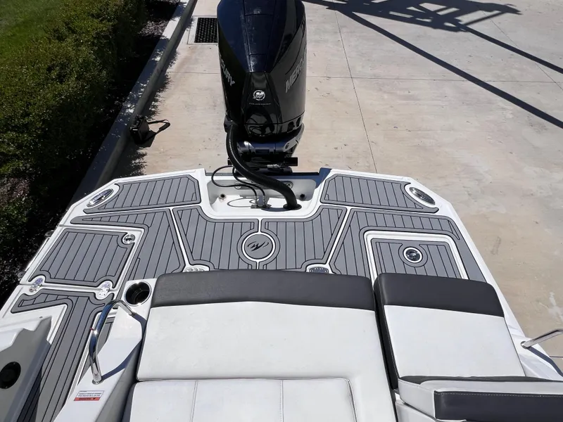 Slide: The Image of 2022 Monterey M45 boat with 250 Verado engine, rear deck view. - 12