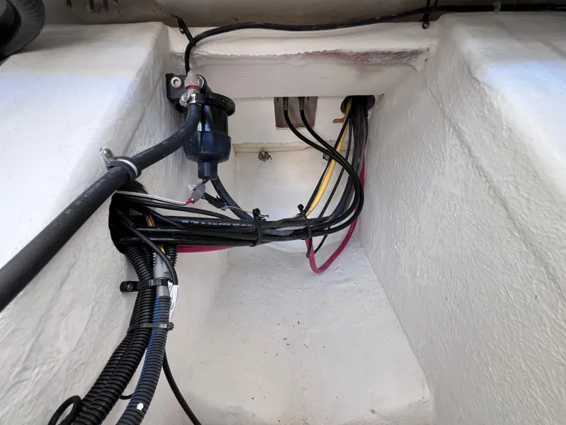 Slide: The Image of Wiring compartment of 2022 Monterey M45 boat, showcasing cables and connections. - 26