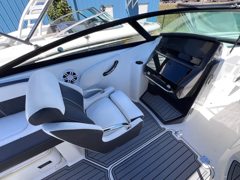 Slide: The Image of 2022 Monterey M45 boat interior with sleek helm and modern seating. - 31