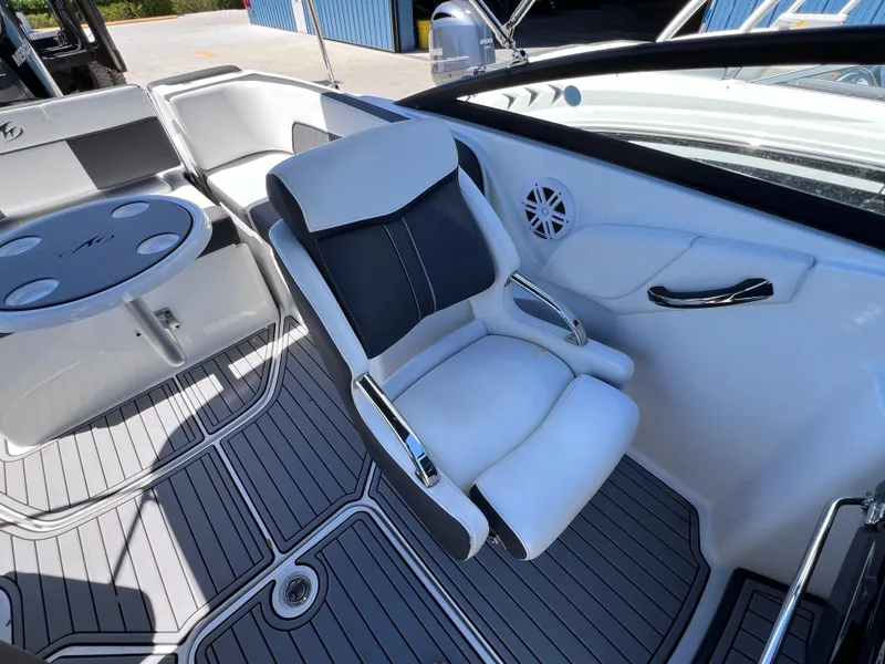 Slide: The Image of 2022 Monterey M45 boat interior with sleek seating and modern design. - 32