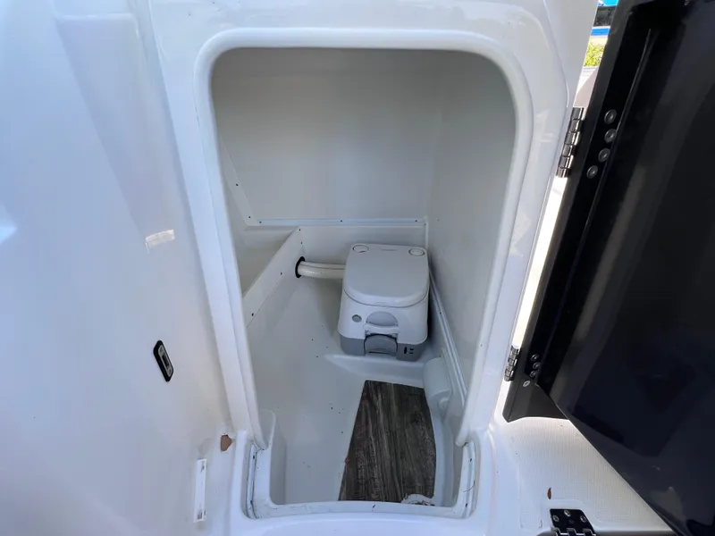Slide: The Image of Compact marine toilet in 2022 Monterey M45 boat cabin. - 37