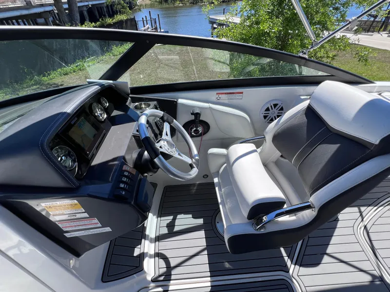 Slide: The Image of Interior of 2022 Monterey M45 boat with modern dashboard and comfortable seating. - 39