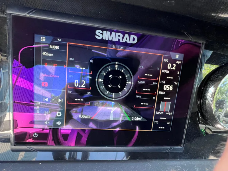 Slide: The Image of Simrad navigation display on 2022 Monterey M45 boat, showing speed and depth metrics. - 42