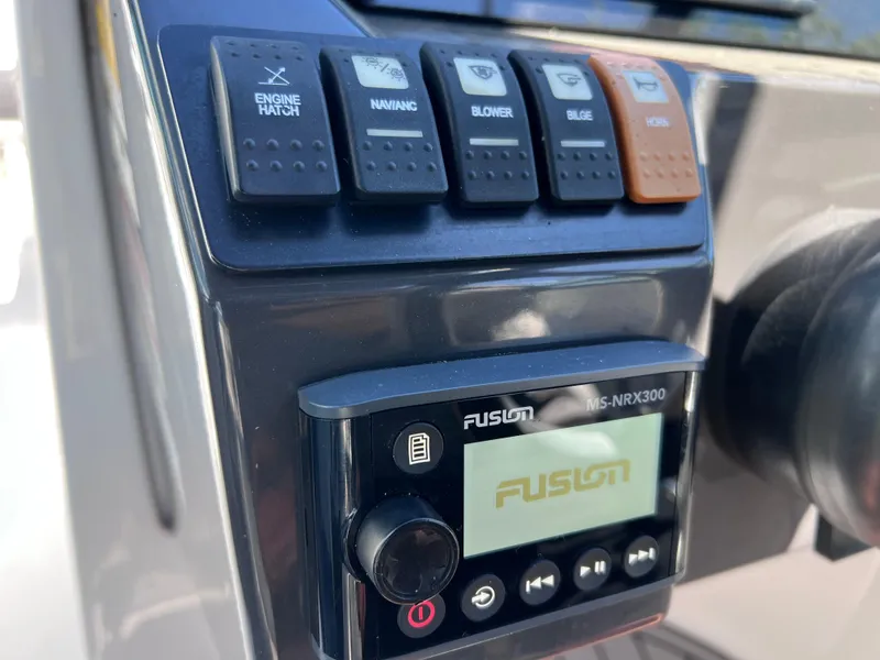 Slide: The Image of Control panel of 2022 Monterey M45 boat with Fusion MS-NRX300 audio system. - 46