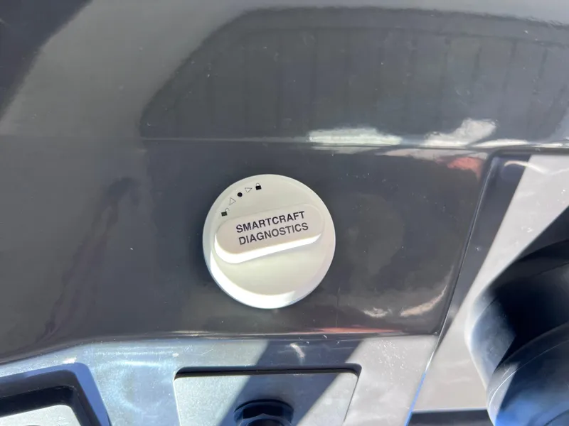 Slide: The Image of SmartCraft Diagnostics button on 2022 Monterey M45 boat dashboard. - 48