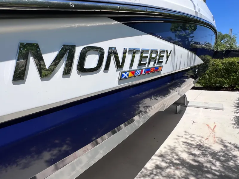 Slide: The Image of 2022 Monterey M45 boat with 250 Verado engine, only 140 hours, side view. - 6