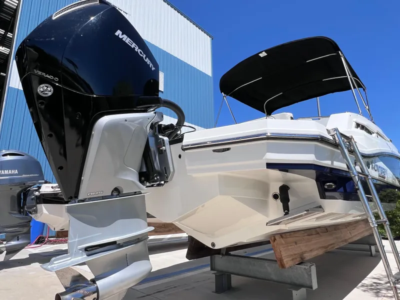 Slide: The Image of 2022 Monterey M45 boat with 250 Verado engine, docked under clear blue sky. - 8