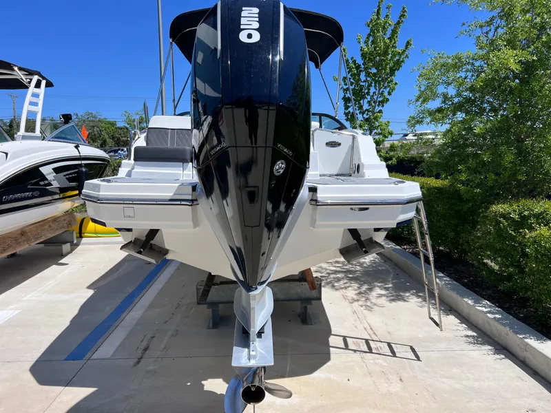 Slide: The Image of 2022 Monterey M45 boat with 250 Verado engine, only 140 hours, docked outdoors. - 9