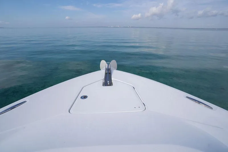 Slide: The Image of Bow view of 2019 HCB 53 boat on calm ocean waters. - 39