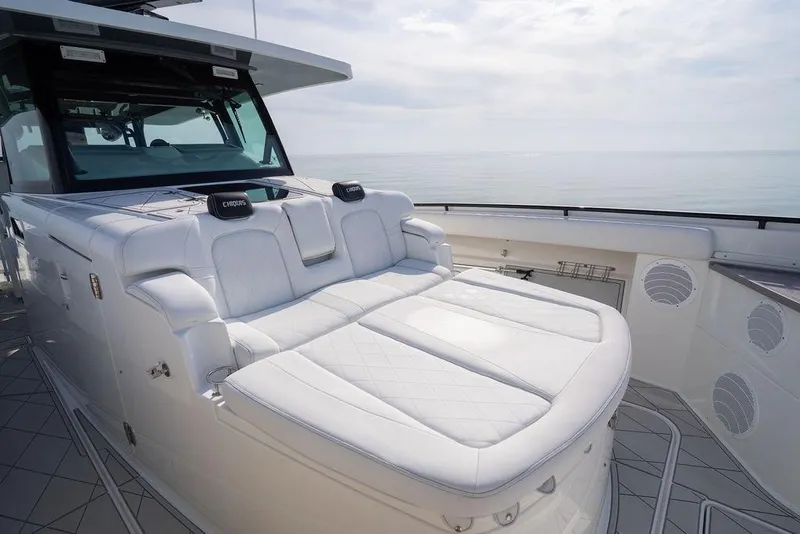Slide: The Image of Luxurious seating on a 2019 HCB 53 yacht with ocean view. - 49