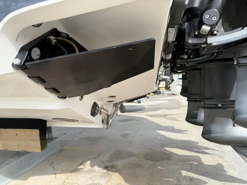 Slide: The Image of 2016 Nor-Tech 392 Super Fish Center Console boat, close-up of the stern and outboard motors. - 10