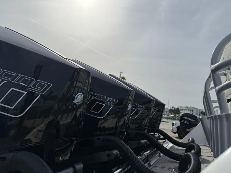 Slide: The Image of 2016 Nor-Tech 392 Super Fish Center Console with powerful outboard engines. - 13