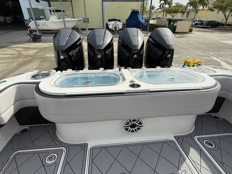Slide: The Image of 2016 Nor-Tech 392 Super Fish Center Console with four powerful outboard engines. - 22
