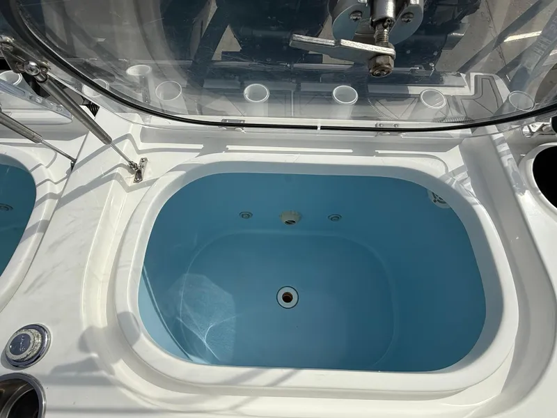 Slide: The Image of Livewell on 2016 Nor-Tech 392 Super Fish Center Console boat. - 24