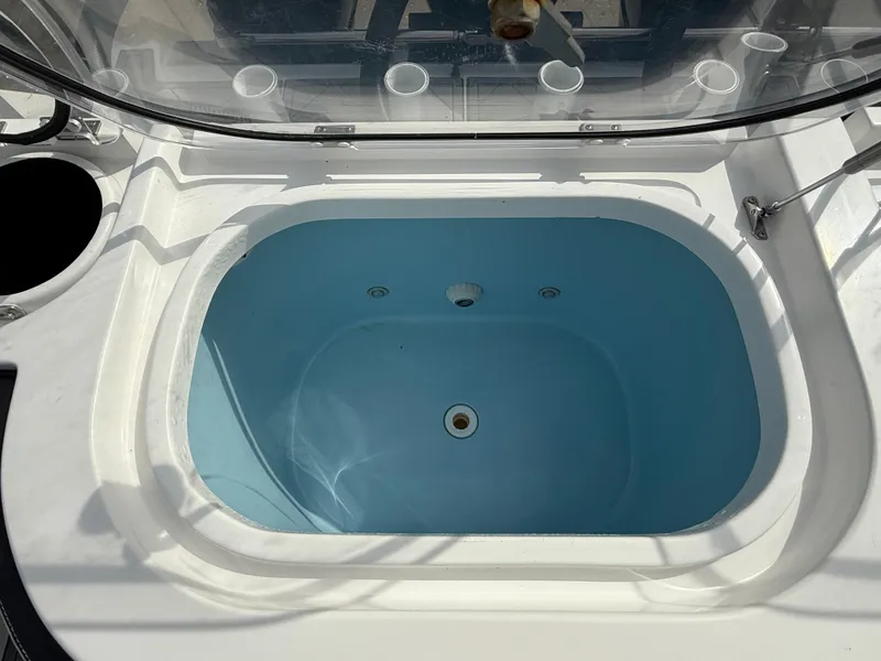 Slide: The Image of Livewell on 2016 Nor-Tech 392 Super Fish Center Console boat. - 25