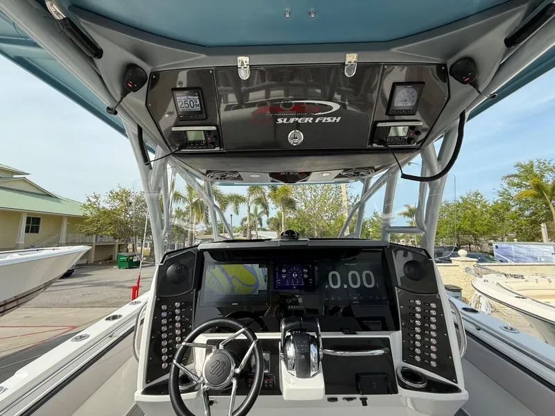 Slide: The Image of 2016 Nor-Tech 392 Super Fish Center Console dashboard with advanced navigation and controls. - 34