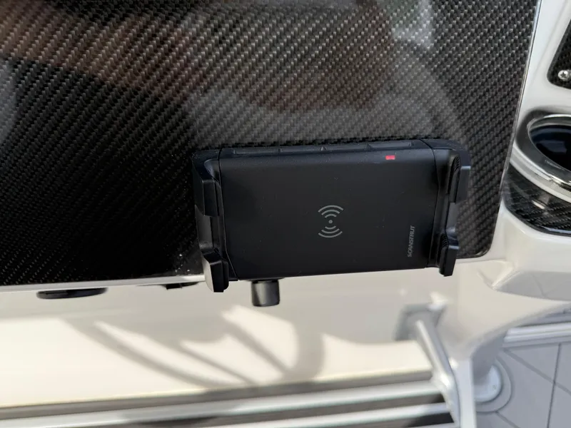Slide: The Image of Phone holder on Nor-Tech 392 Super Fish Center Console, 2016 model, with carbon fiber finish. - 40