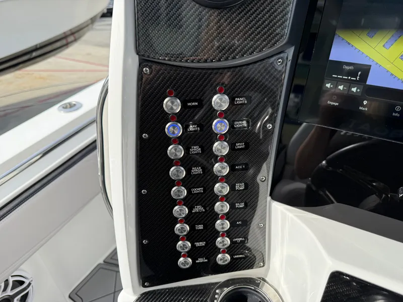 Slide: The Image of Control panel of 2016 Nor-Tech 392 Super Fish Center Console boat. - 41