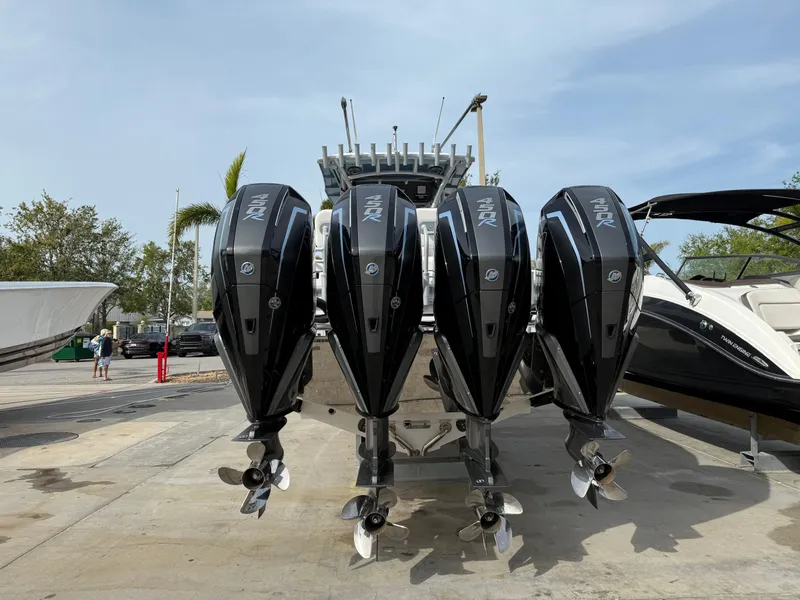 Slide: The Image of 2016 Nor-Tech 392 Super Fish Center Console with four powerful outboard engines. - 7