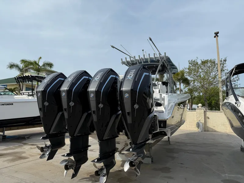 Slide: The Image of 2016 Nor-Tech 392 Super Fish Center Console with four powerful outboard engines. - 8