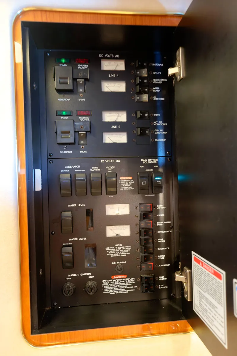 Slide: The Image of Electrical panel inside a 2000 Sea Ray 340 Sundancer boat. - 37
