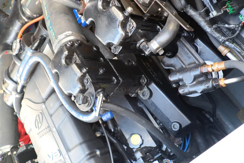 Slide: The Image of Engine components of a 2000 Sea Ray 340 Sundancer boat, showcasing intricate mechanical details. - 40