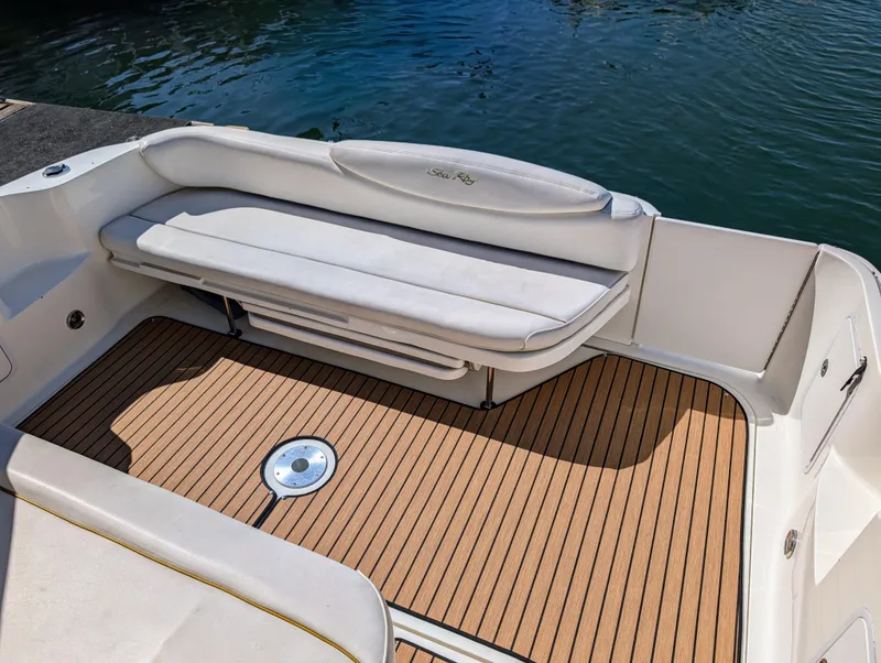 Slide: The Image of 2000 Sea Ray 340 Sundancer boat with white seating and teak deck. - 8