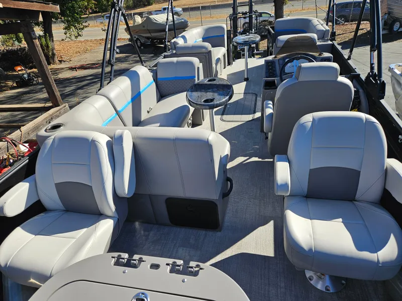 Slide: The Image of 2022 Apex Marine Qwest E CLASS 822 XRE TRITUNE with spacious seating and modern design. - 11