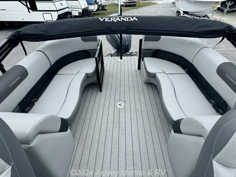 Slide: The Image of 2025 Veranda Relax Series 22RC pontoon boat with spacious seating and sleek design. - 11