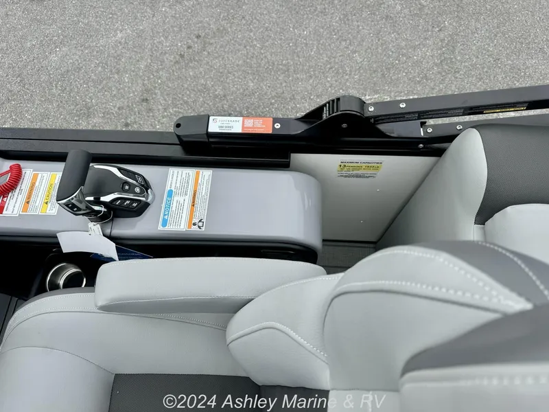 Slide: The Image of 2025 Veranda Relax Series 22RC boat interior with control panel and seating. - 6