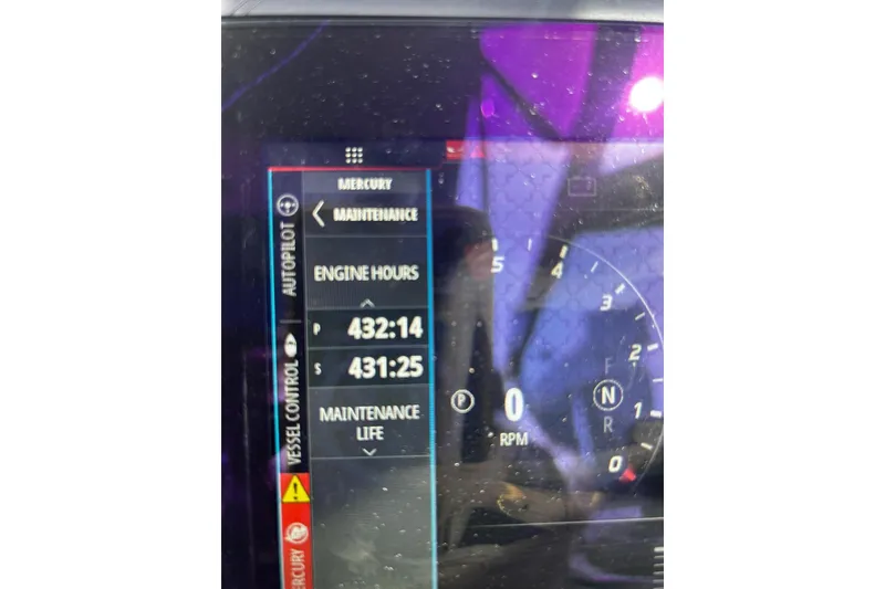 Slide: The Image of Dashboard of 2017 Formula 350 Crossover Bowrider OB showing engine hours and maintenance. - 19