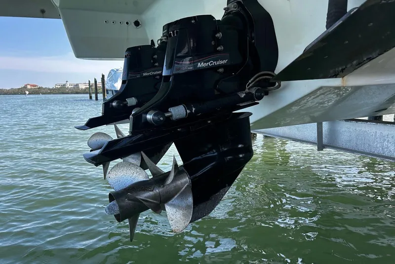 Slide: The Image of 2017 Formula 350 Crossover Bowrider OB with MerCruiser outboard engines in water. - 21