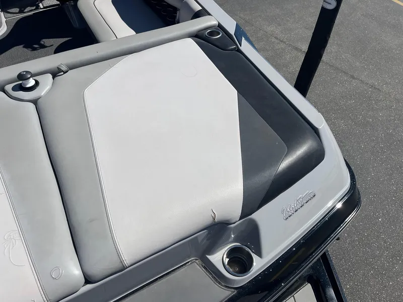 Slide: The Image of 2017 Axis Boats T22 interior with gray and black upholstery detail. - 18