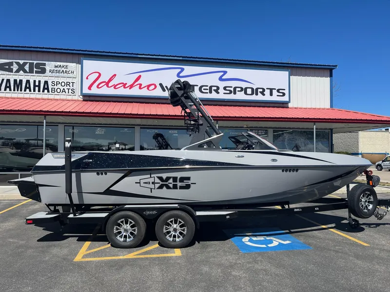 Slide: The Image of 2017 Axis Boats T22 on trailer at Idaho Water Sports dealership. - 3