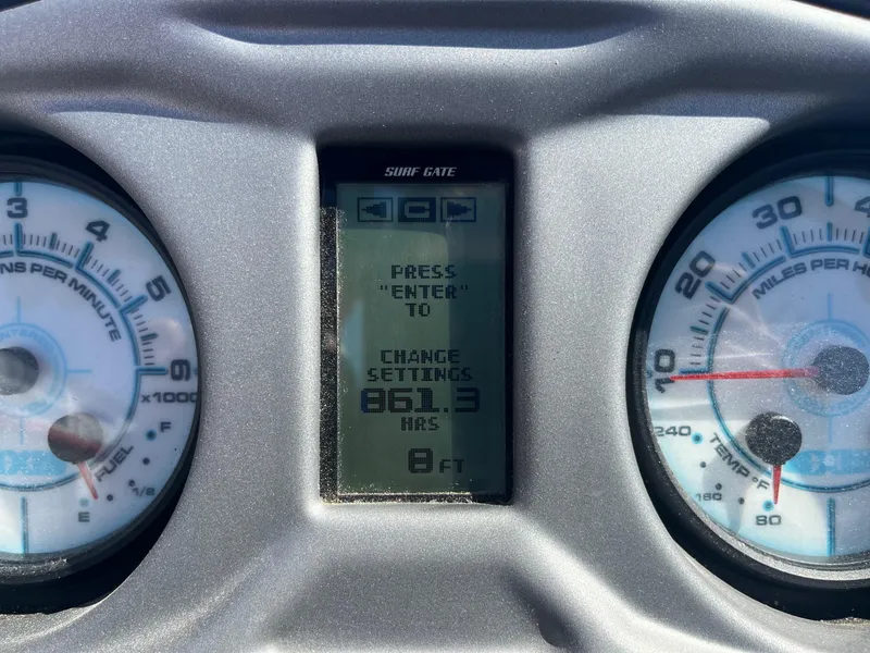 Slide: The Image of Dashboard of a 2017 Axis Boats T22 showing 861.3 hours and speedometer. - 32