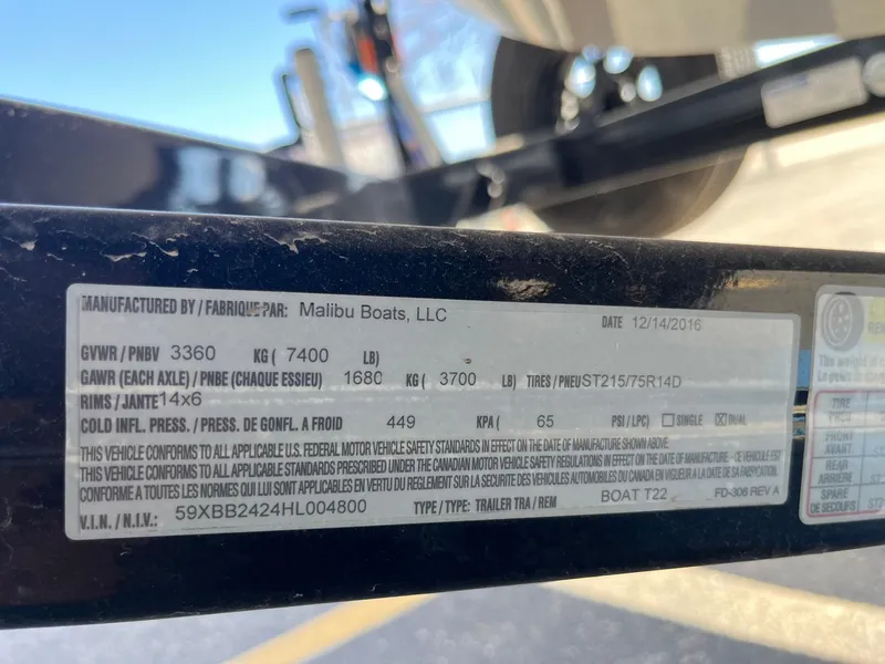 Slide: The Image of Label on 2017 Axis Boats T22 trailer by Malibu Boats, showing specifications and compliance details. - 37
