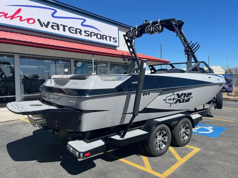 Slide: The Image of 2017 Axis Boats T22 parked at Idaho Water Sports dealership. - 4