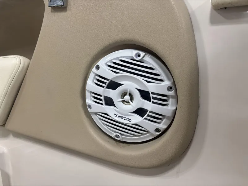 Slide: The Image of Kenwood speaker installed in a 2007 Tahoe Q8i boat interior. - 13