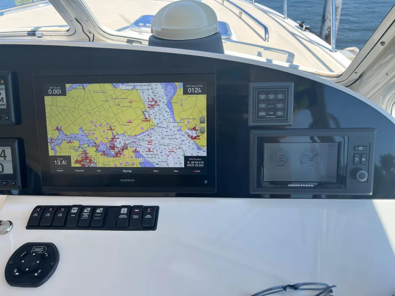Slide: The Image of Control panel of 2016 MJM 50z yacht with navigation display and controls. - 10