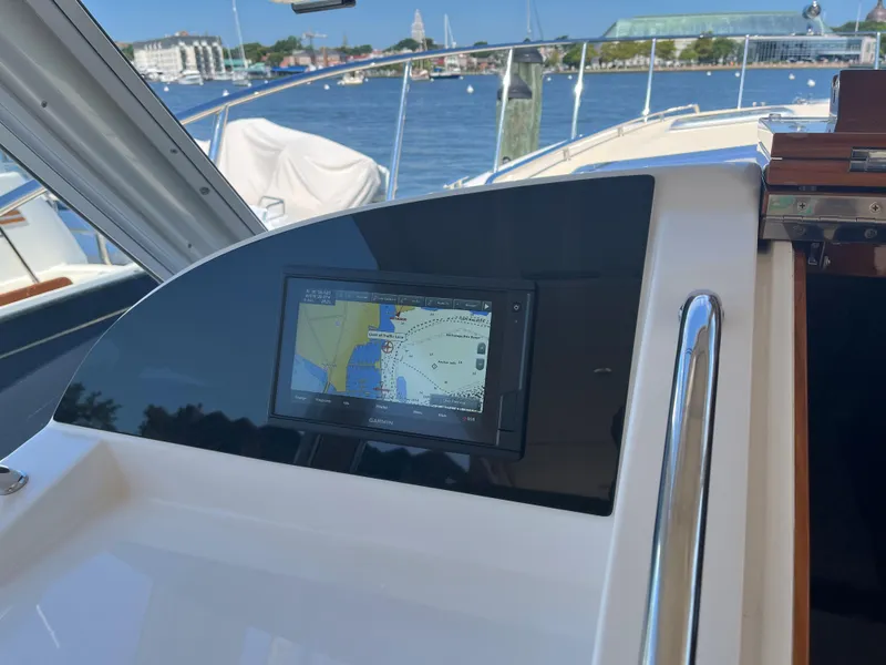 Slide: The Image of MJM 50z 2016 yacht with navigation display, docked by waterfront. - 12