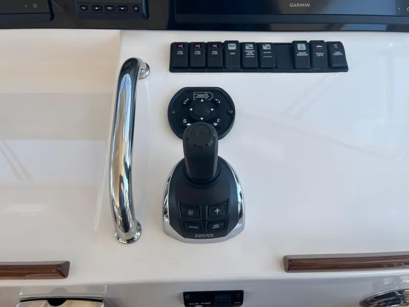 Slide: The Image of Control panel of 2016 MJM 50z boat with joystick and switches. - 14