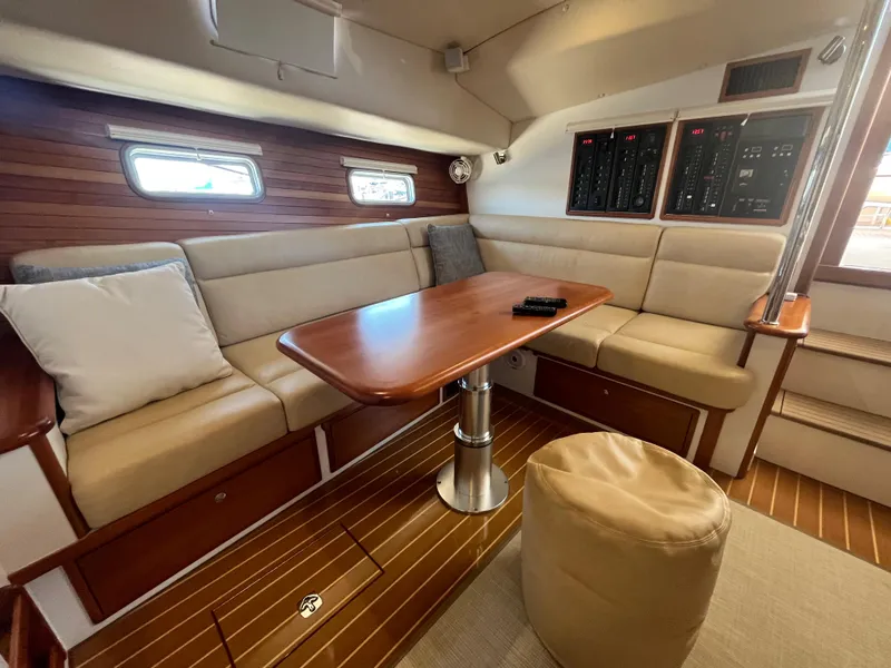 Slide: The Image of Luxurious interior of a 2016 MJM 50z yacht with plush seating and wooden accents. - 18