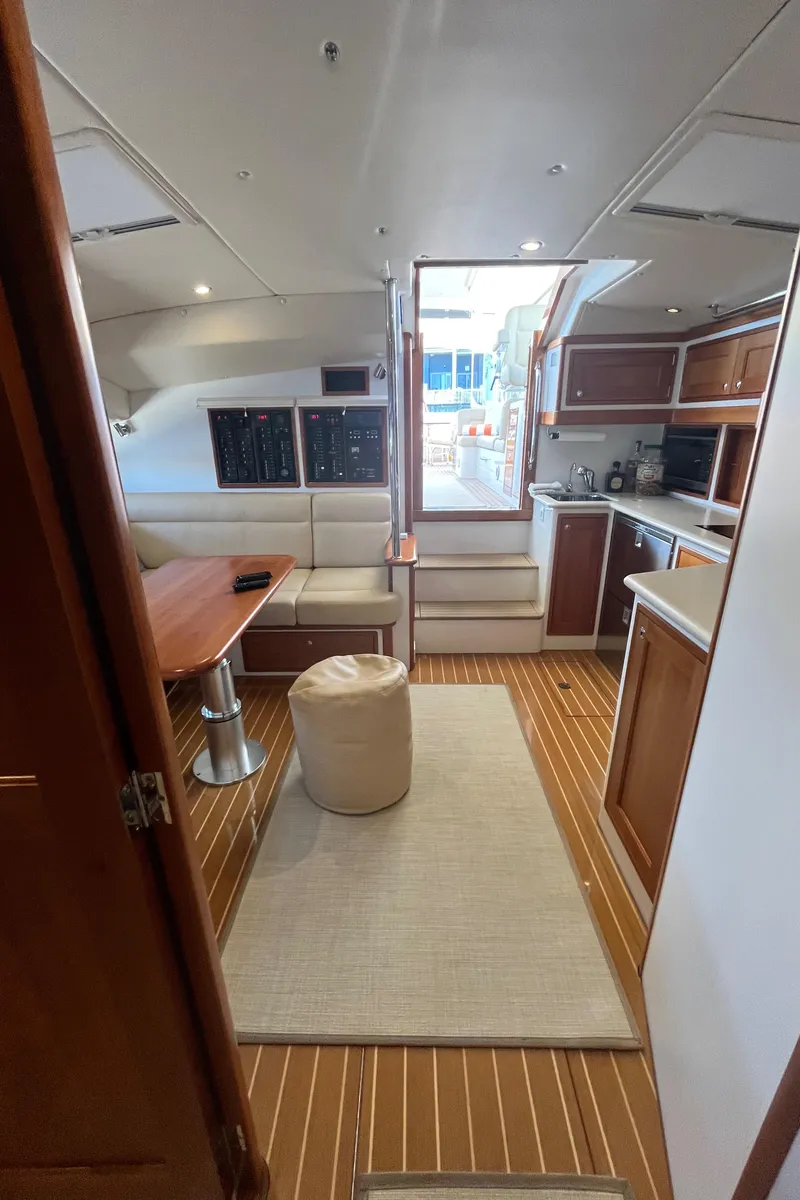 Slide: The Image of Interior of 2016 MJM 50z yacht with modern kitchen and seating area. - 30