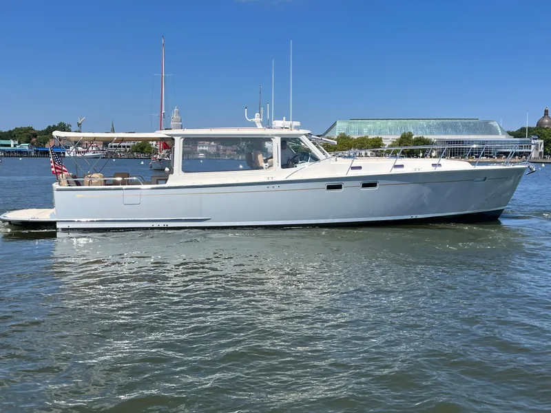 Slide: The Image of 2016 MJM 50z yacht cruising on a sunny day in calm waters. - 33