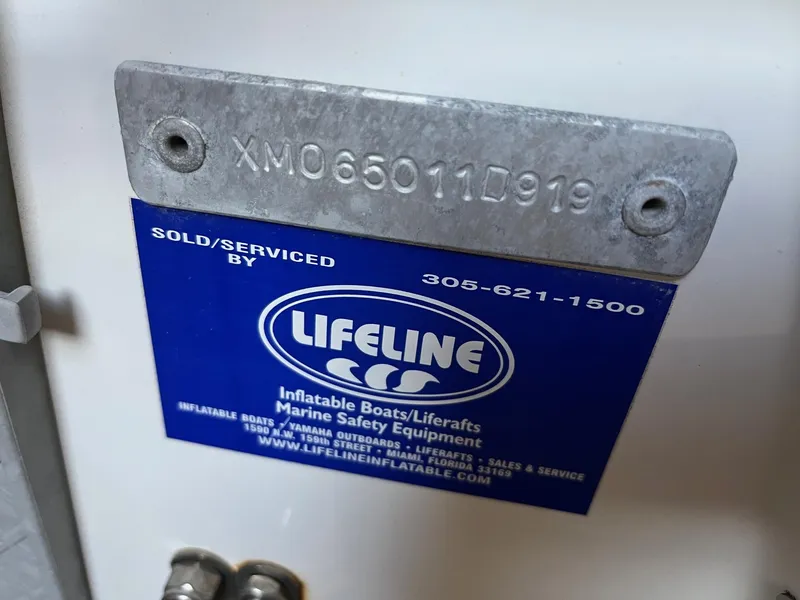 Slide: The Image of 2016 MJM 50z boat identification plate with Lifeline service label. - 34