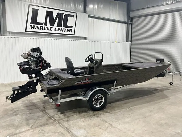 Slide: The Image of 2025 Gator Tail 1860 Extreme series boat in a showroom, featuring a sleek design. - 10