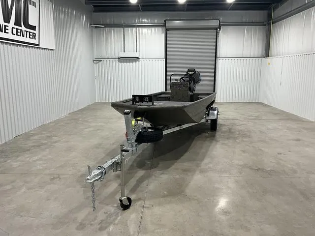 Slide: The Image of 2025 Gator Tail 1860 Extreme series boat in a garage, on a trailer. - 6