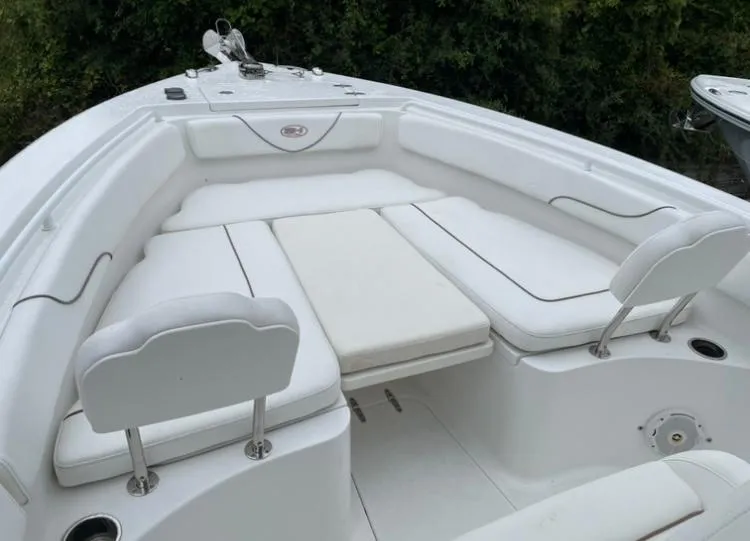 Slide: The Image of 2018 Sea Hunt Gamefish 25 boat with spacious white seating area. - 13