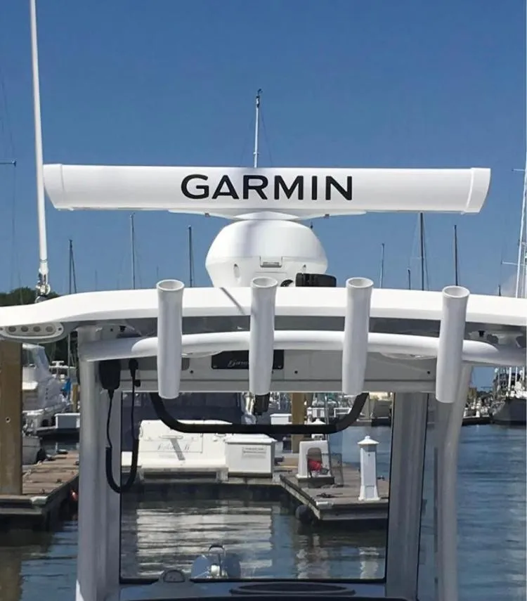 Slide: The Image of 2018 Sea Hunt Gamefish 25 boat with Garmin radar at marina. - 16